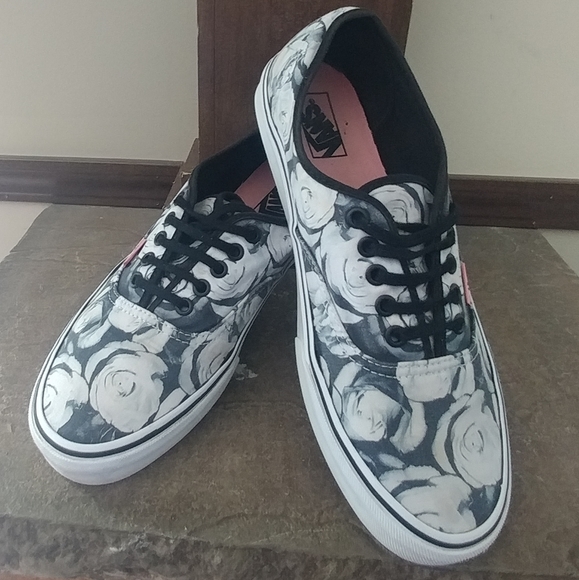 black vans with white roses